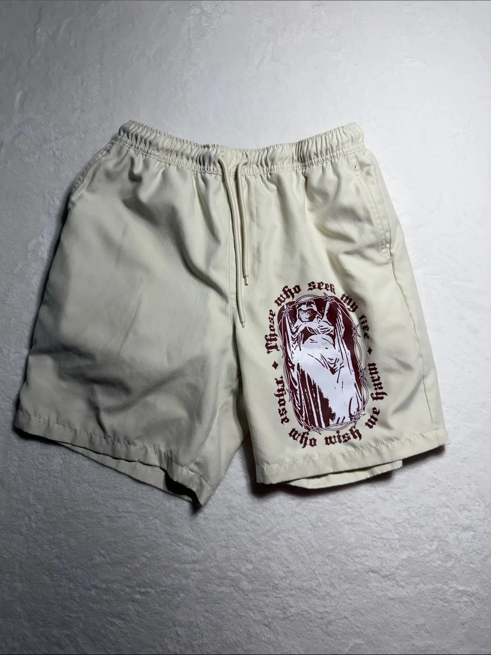 Empyre Cream Swim Shorts with Maroon Graphic